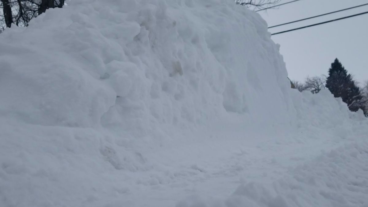 Snow piles on the side of a street in Cheyenne, Wyoming