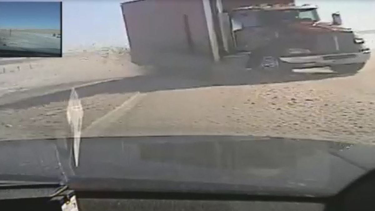 Video from Wyoming Highway Patrol cruiser as a box truck crashed into the back.