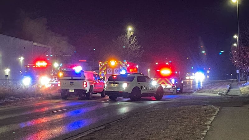 Police and fire rescue vehicles block off West Cornhusker very early Wednesday morning in...