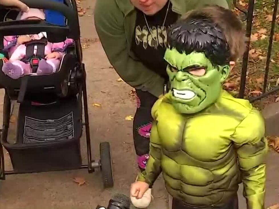 Kids go trick or treating in Wallingford